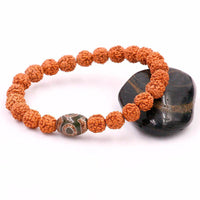Bracelet en graines de Rudraksha naturelles et œil de Dzi