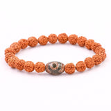 Bracelet en graines de Rudraksha naturelles et œil de Dzi