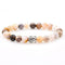 Bracelets multi couleurs en pierres naturelles d’Onyx et tête de Bouddha }
