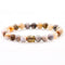 Bracelets multi couleurs en pierres naturelles d’Onyx et tête de Bouddha }