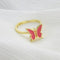 Bague rotative anti stress Papillon }